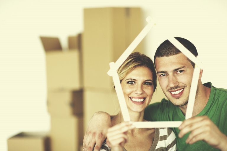 Young Couple Moving In New House